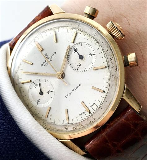 gold breitling watch vintage